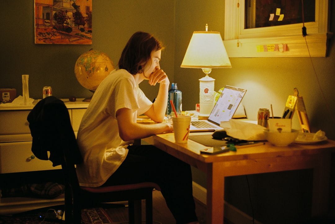 Woman reviewing financial documents at her desk