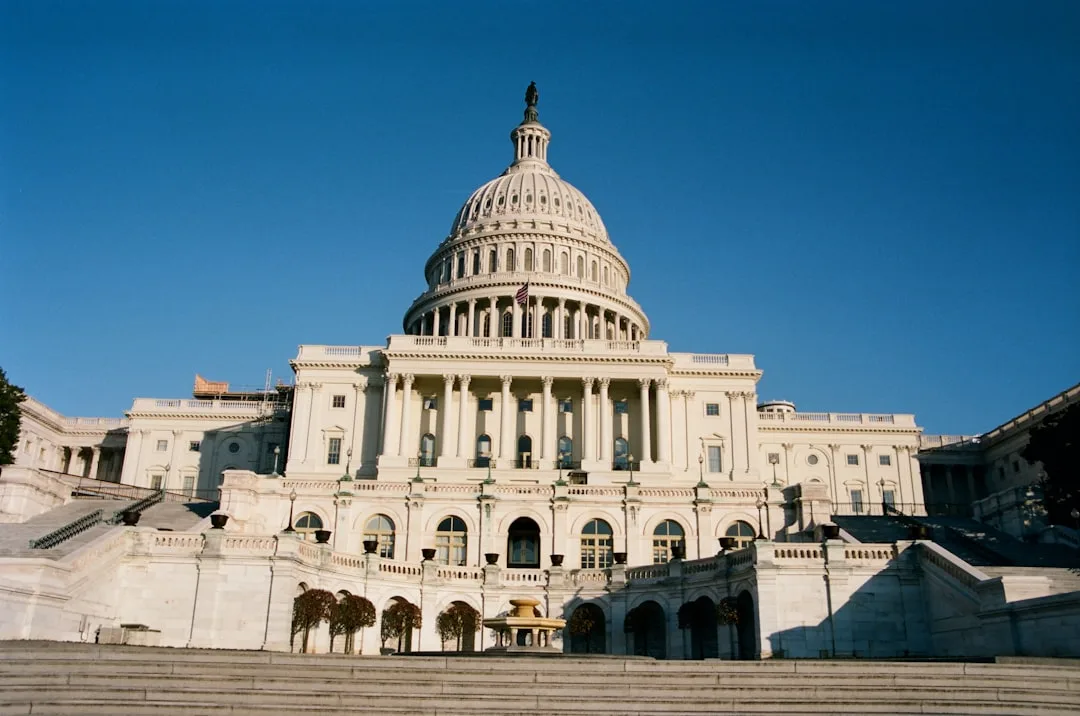 US Capitol building in Washington DC against a dramatic sky