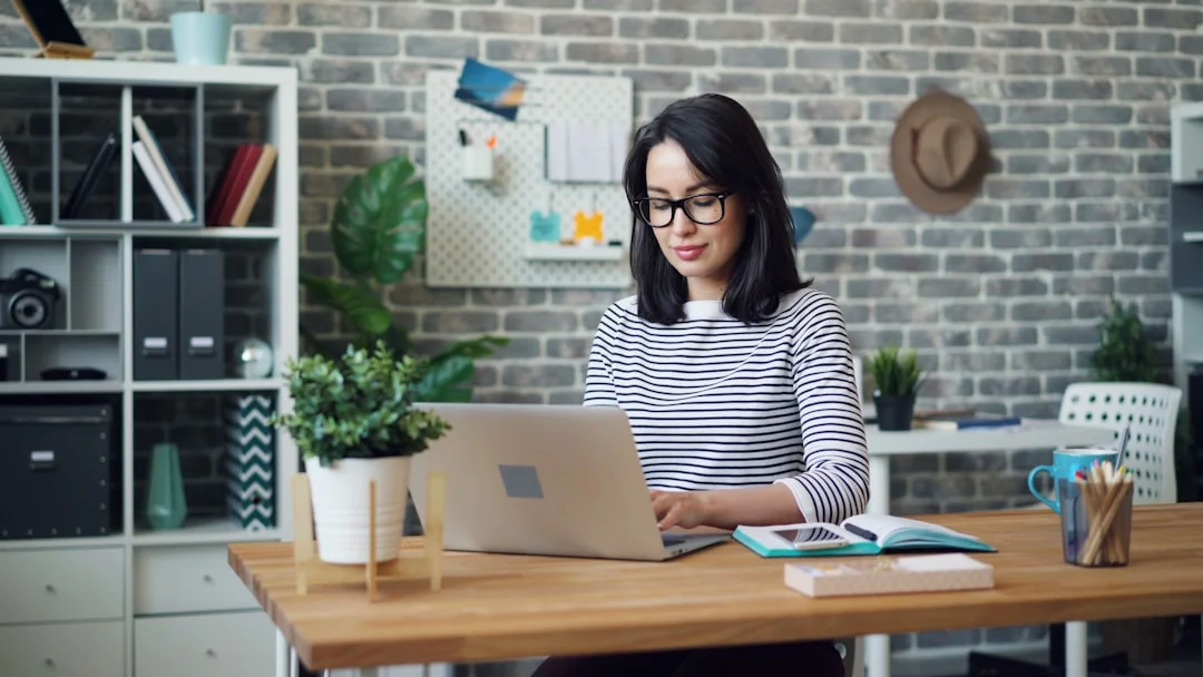 Mei Lin Zhang at her laptop in the DataWeave office