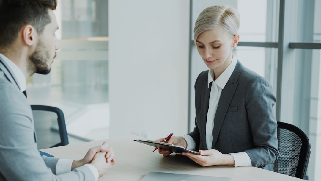 Woman business owner meeting with a CDFI loan officer