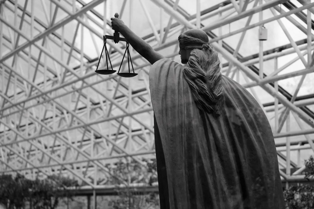 Scales of justice in a courtroom setting