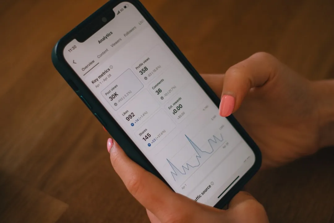 Woman reviewing her business financial dashboard on mobile