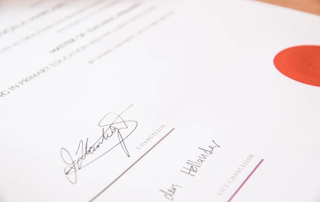 Close-up of patent and trademark registration certificates
