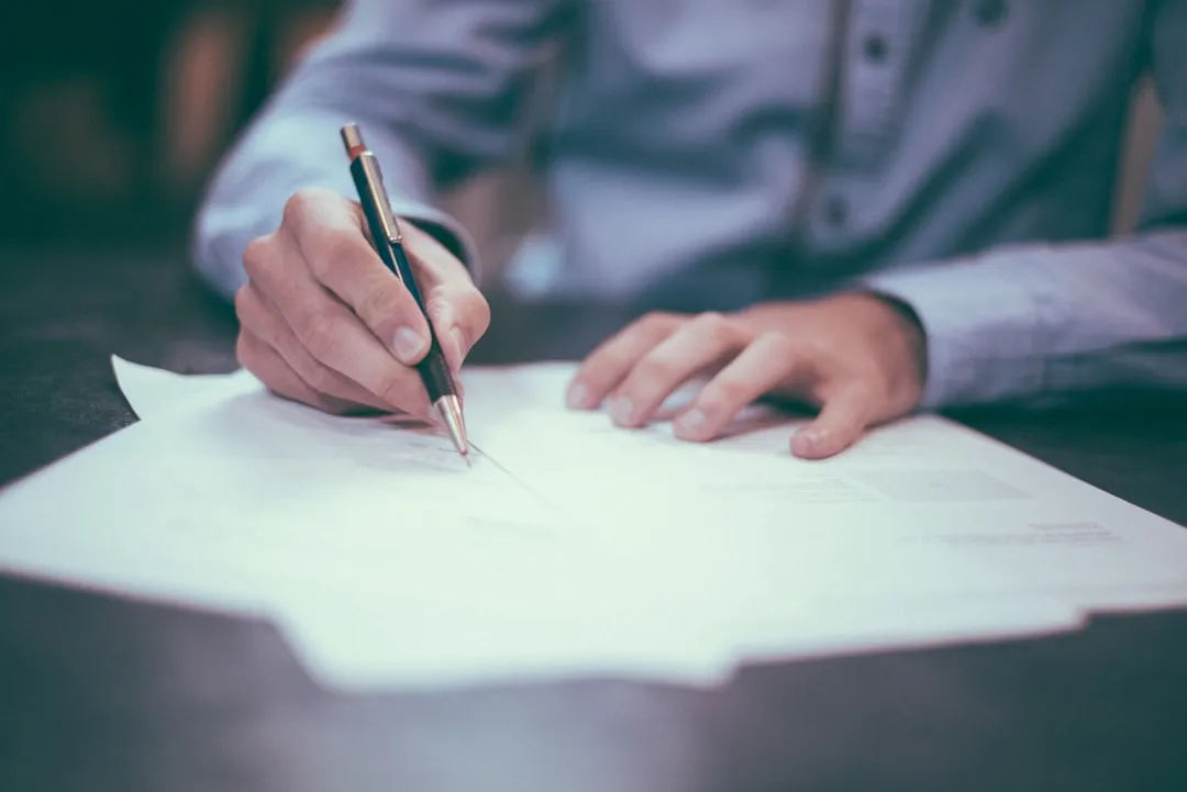 Business contract and legal document with pen
