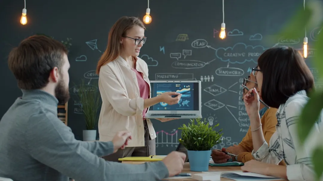 Women business owners collaborating on strategy in a boardroom
