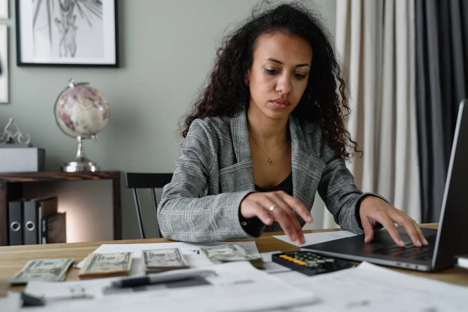 Professional woman analyzing financial documents and managing business savings