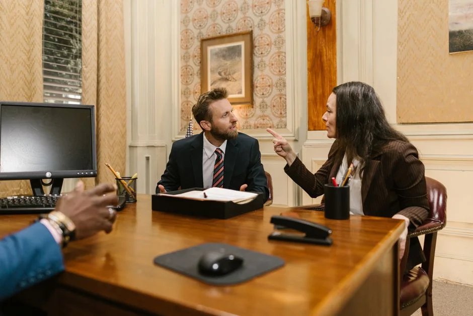 Woman professional meeting with attorney in legal consultation